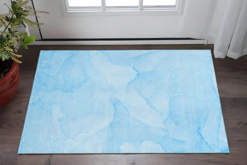 Blue And Ivory Abstract Washable Area Rug With UV Protection Photo 2