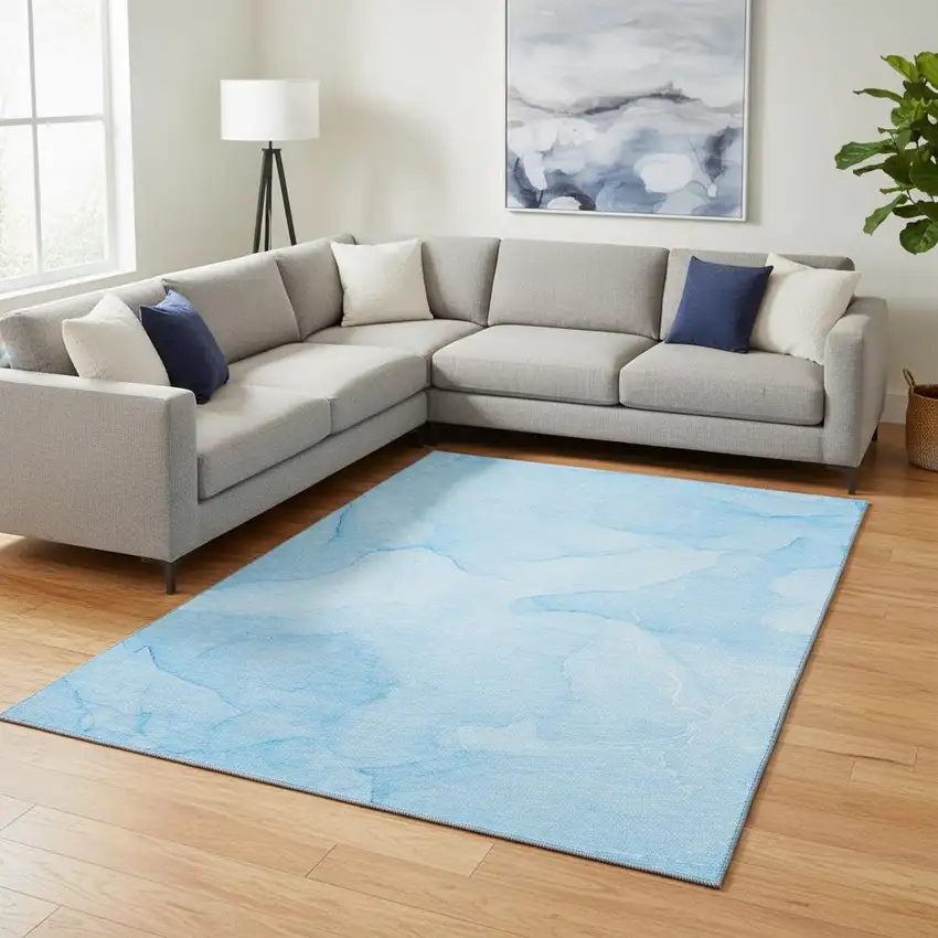 Blue And Ivory Abstract Washable Area Rug With UV Protection Photo 1
