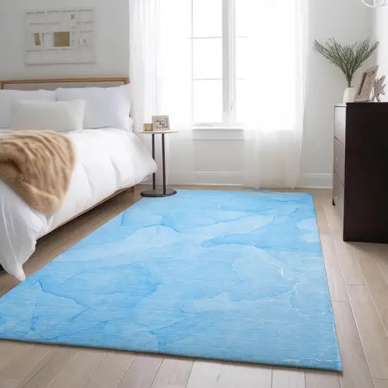 Blue And Ivory Abstract Washable Area Rug With UV Protection Photo 4