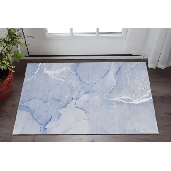 Blue And Ivory Abstract Washable Area Rug With UV Protection Photo 2
