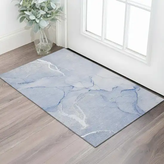 Blue And Ivory Abstract Washable Area Rug With UV Protection Photo 2