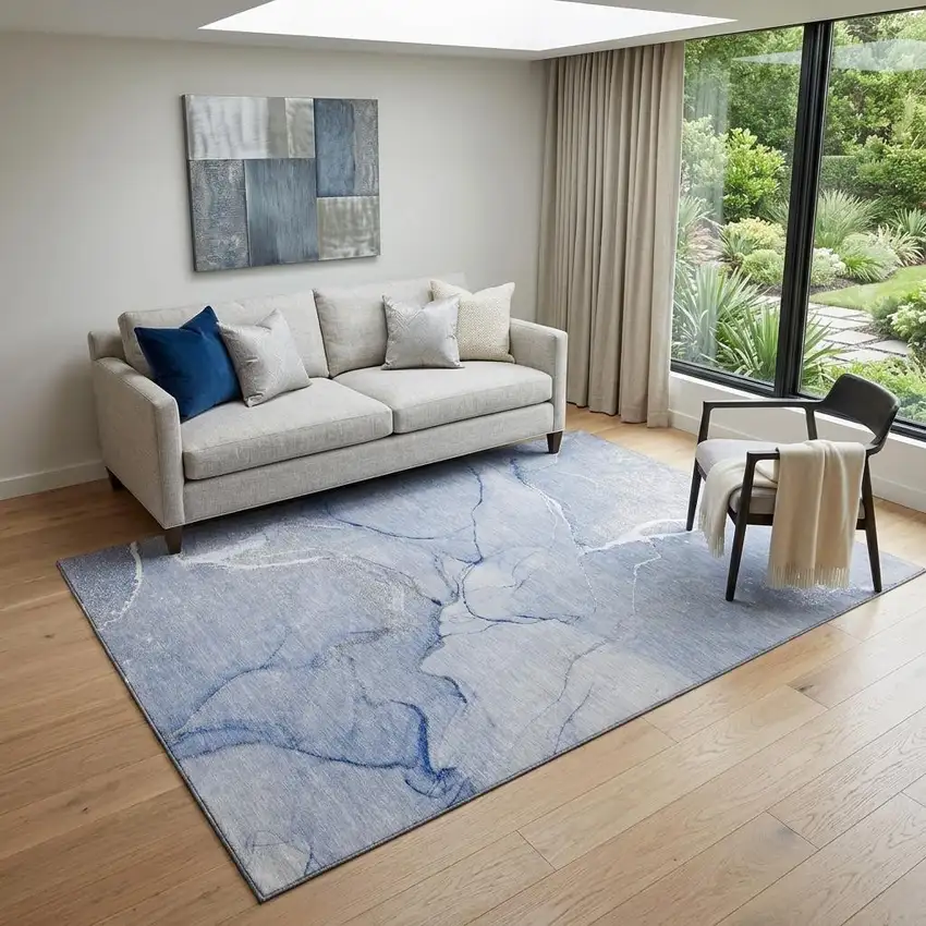 Blue And Ivory Abstract Washable Area Rug With UV Protection Photo 1