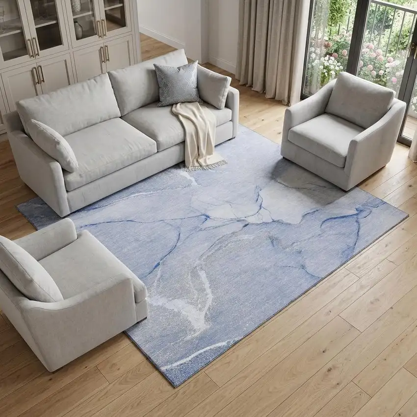 Blue And Ivory Abstract Washable Area Rug With UV Protection Photo 1