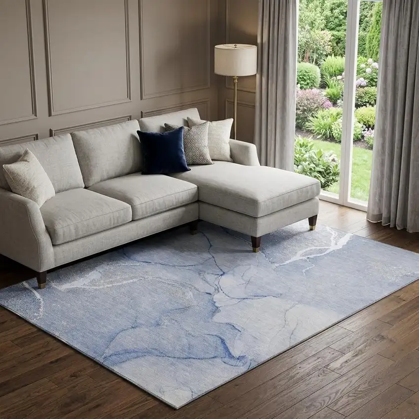 Blue And Ivory Abstract Washable Area Rug With UV Protection Photo 1