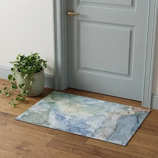 Blue And Ivory Abstract Washable Area Rug With UV Protection Photo 1