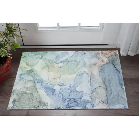 Blue And Ivory Abstract Washable Area Rug With UV Protection Photo 2