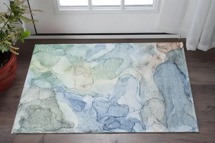 Blue And Ivory Abstract Washable Area Rug With UV Protection Photo 2