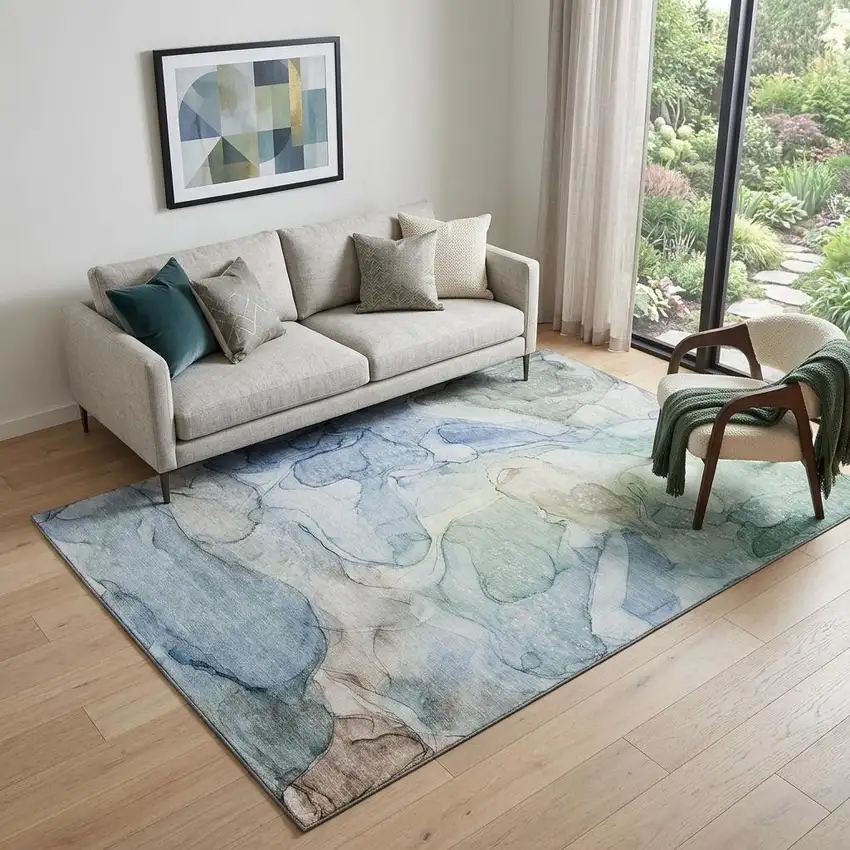 Blue And Ivory Abstract Washable Area Rug With UV Protection Photo 1