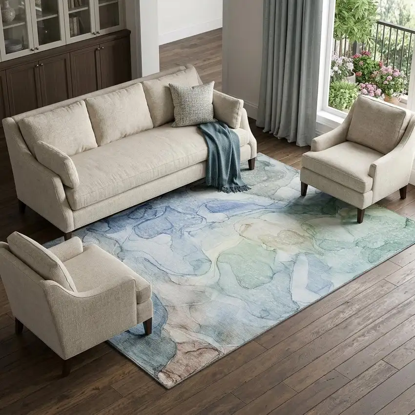 Blue And Ivory Abstract Washable Area Rug With UV Protection Photo 1