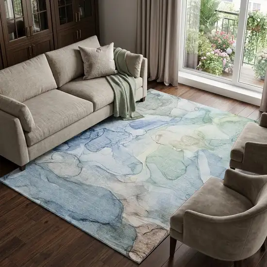 Blue And Ivory Abstract Washable Area Rug With UV Protection Photo 1