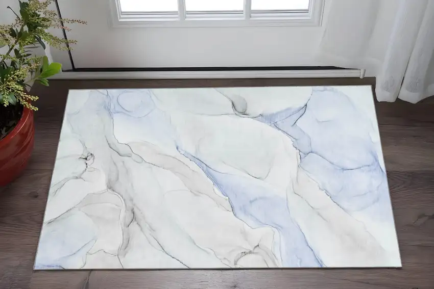 Blue And Ivory Abstract Washable Area Rug With UV Protection Photo 2