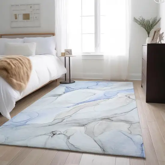 Blue And Ivory Abstract Washable Area Rug With UV Protection Photo 5