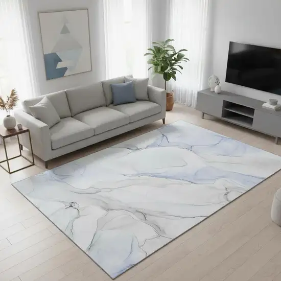 Blue And Ivory Abstract Washable Area Rug With UV Protection Photo 2