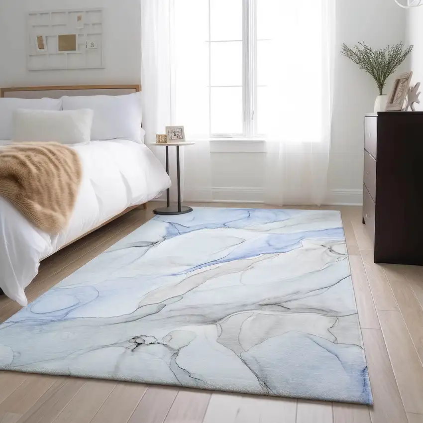 Blue And Ivory Abstract Washable Area Rug With UV Protection Photo 6