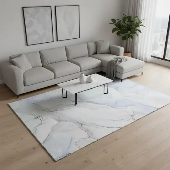 Blue And Ivory Abstract Washable Area Rug With UV Protection Photo 2