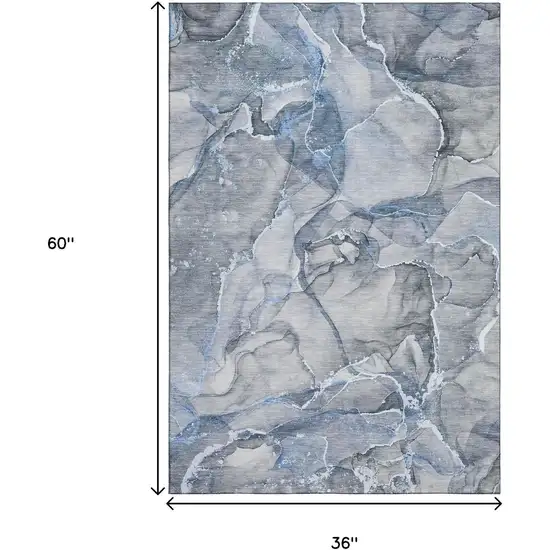 Blue And Ivory Abstract Washable Area Rug With UV Protection Photo 3