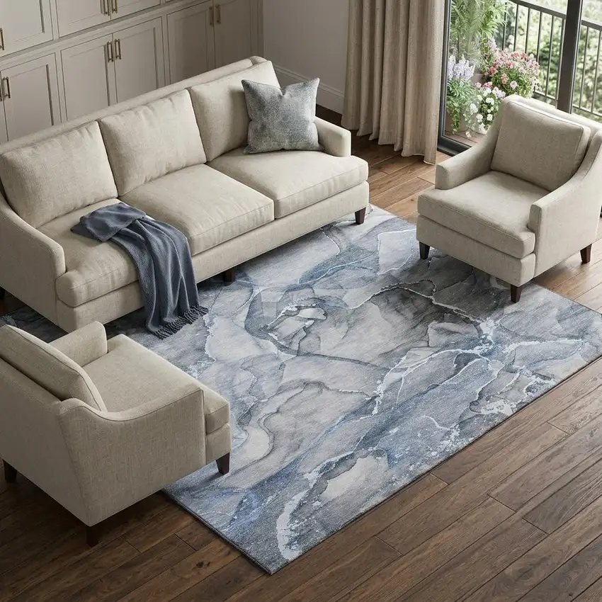 Blue And Ivory Abstract Washable Area Rug With UV Protection Photo 1