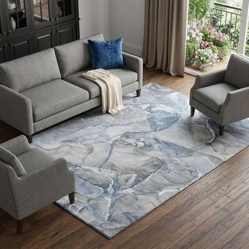Blue And Ivory Abstract Washable Area Rug With UV Protection Photo 1