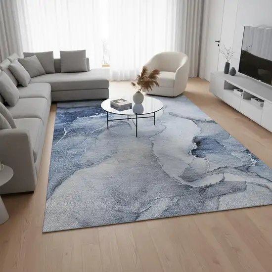 Blue And Ivory Abstract Washable Area Rug With UV Protection Photo 2