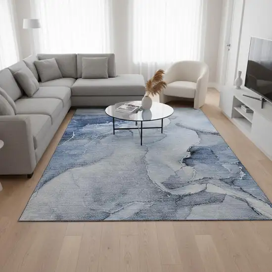 Blue And Ivory Abstract Washable Area Rug With UV Protection Photo 3