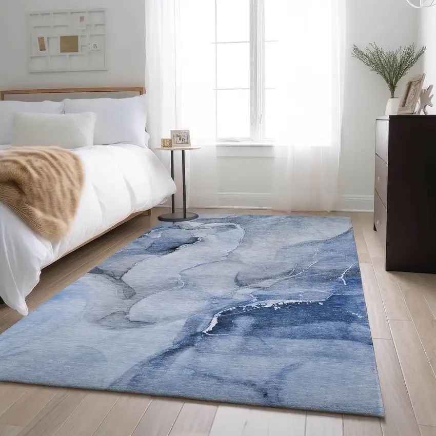Blue And Ivory Abstract Washable Area Rug With UV Protection Photo 6