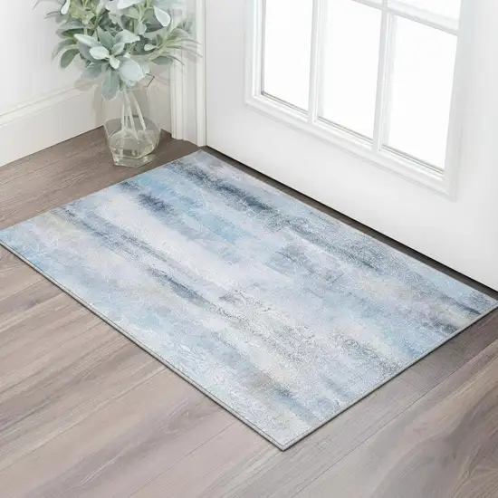 Blue And Ivory Abstract Washable Area Rug With UV Protection Photo 2