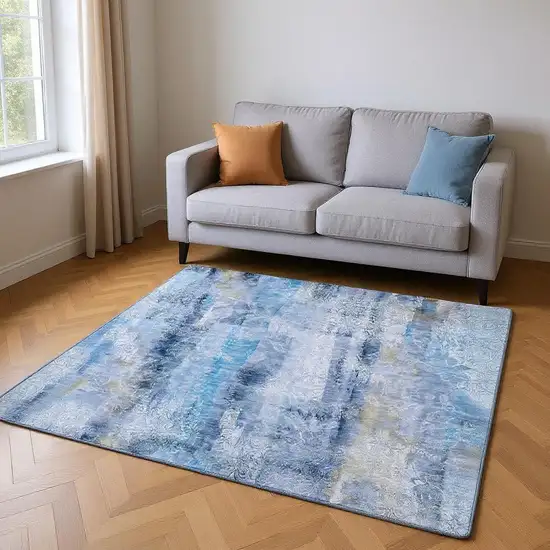 Blue And Ivory Abstract Washable Area Rug With UV Protection Photo 2