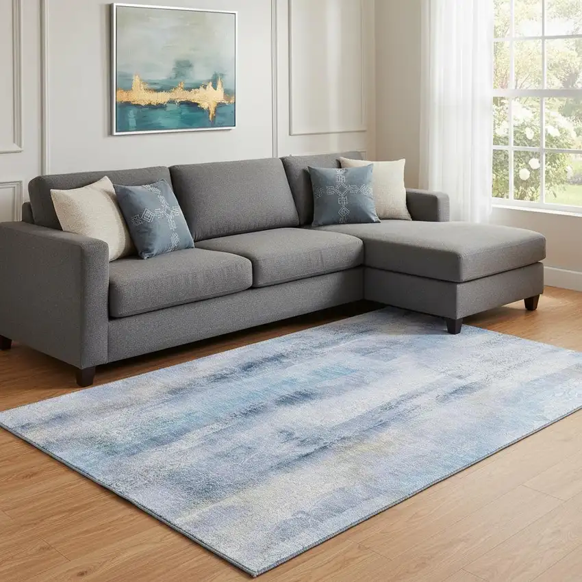 Blue And Ivory Abstract Washable Area Rug With UV Protection Photo 1