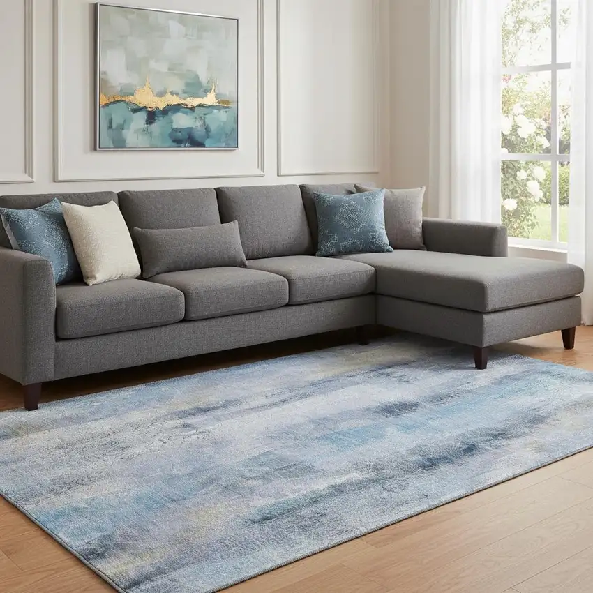 Blue And Ivory Abstract Washable Area Rug With UV Protection Photo 1