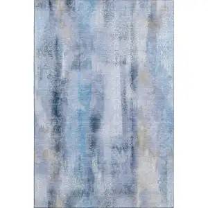 Photo of Blue And Ivory Abstract Washable Area Rug With UV Protection