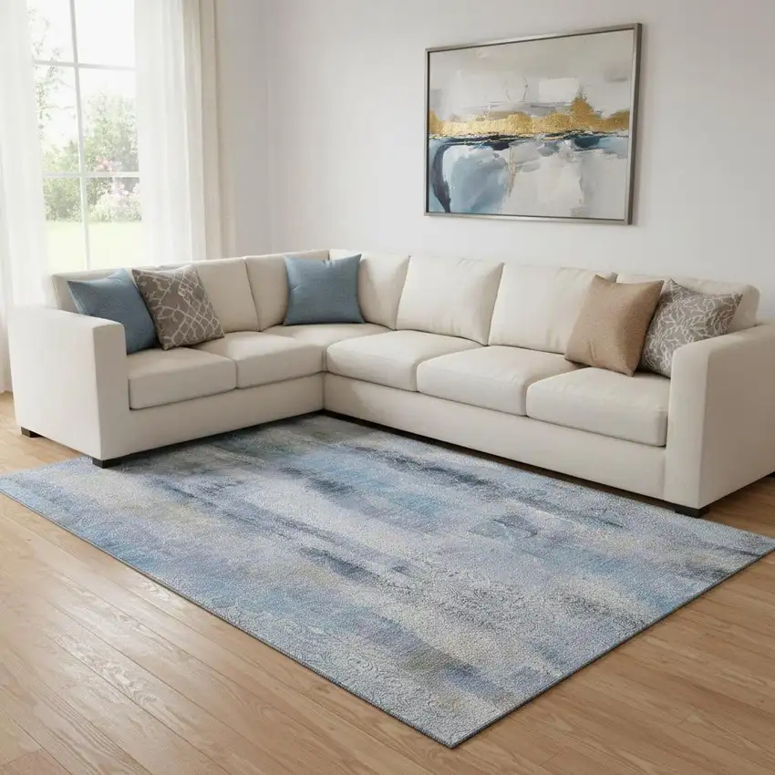 Blue And Ivory Abstract Washable Area Rug With UV Protection Photo 1