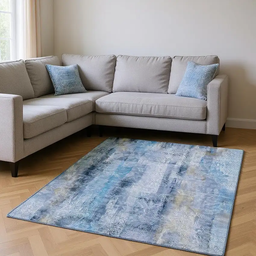 Blue And Ivory Abstract Washable Area Rug With UV Protection Photo 2