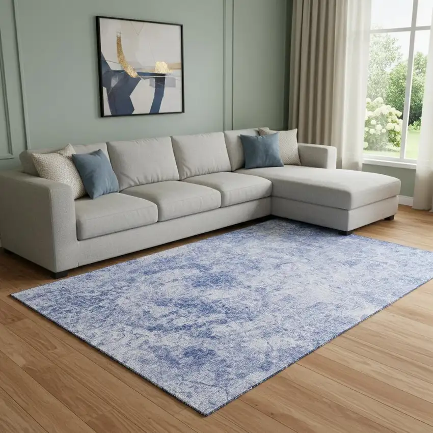 Blue And Ivory Abstract Washable Area Rug With UV Protection Photo 1