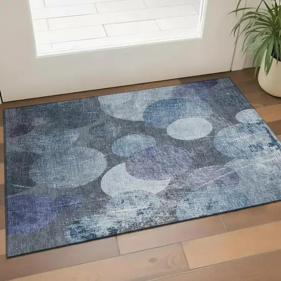 Blue And Ivory Abstract Washable Area Rug With UV Protection Photo 1