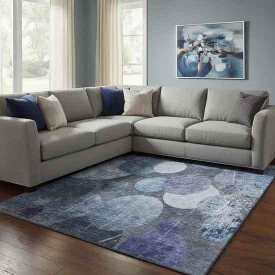 Blue And Ivory Abstract Washable Area Rug With UV Protection Photo 1