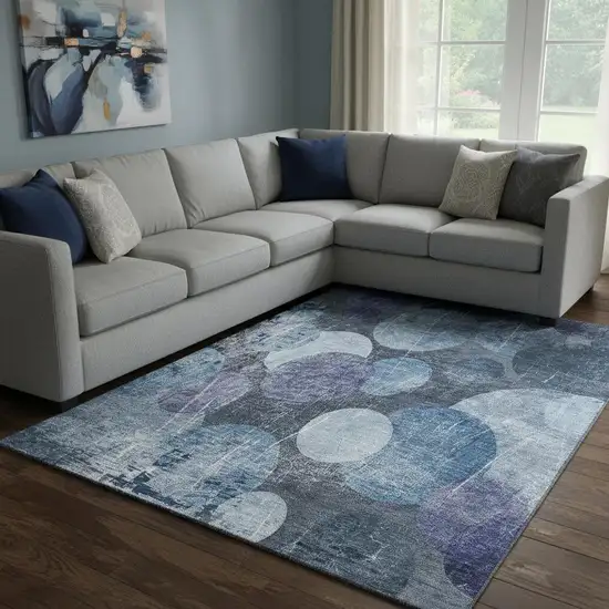 Blue And Ivory Abstract Washable Area Rug With UV Protection Photo 1