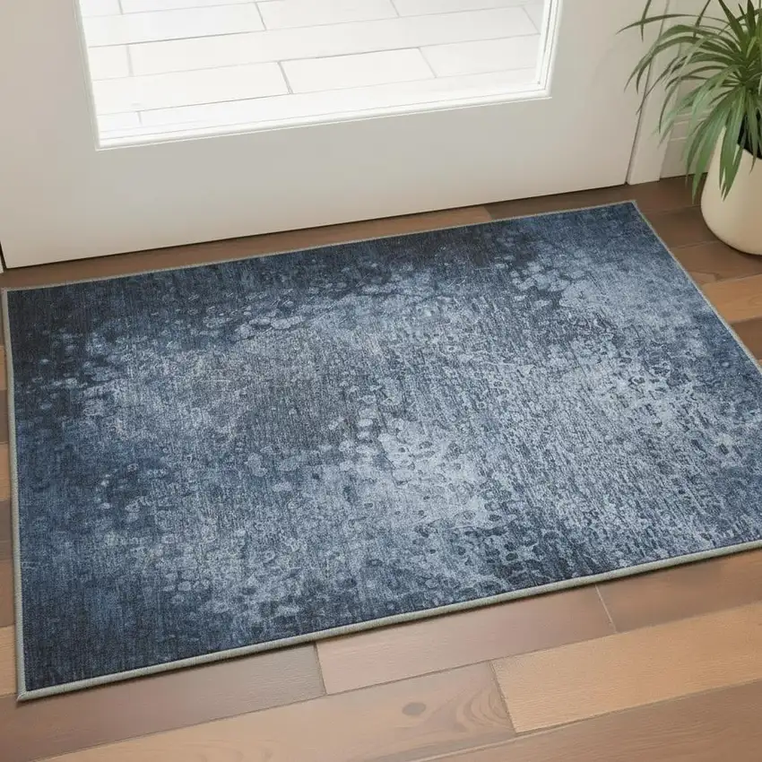 Blue And Ivory Abstract Washable Area Rug With UV Protection Photo 2