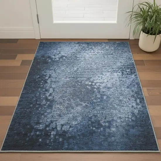 Blue And Ivory Abstract Washable Area Rug With UV Protection Photo 3