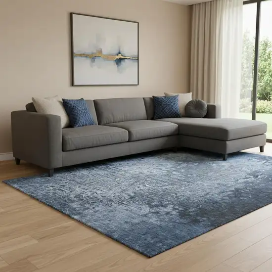 Blue And Ivory Abstract Washable Area Rug With UV Protection Photo 1