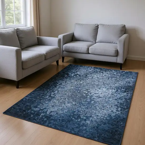 Blue And Ivory Abstract Washable Area Rug With UV Protection Photo 2