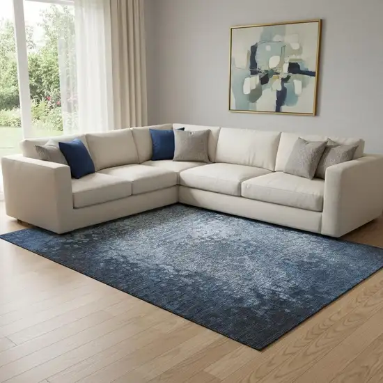 Blue And Ivory Abstract Washable Area Rug With UV Protection Photo 1