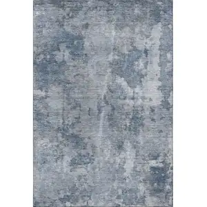 Photo of Blue And Ivory Abstract Washable Area Rug With UV Protection