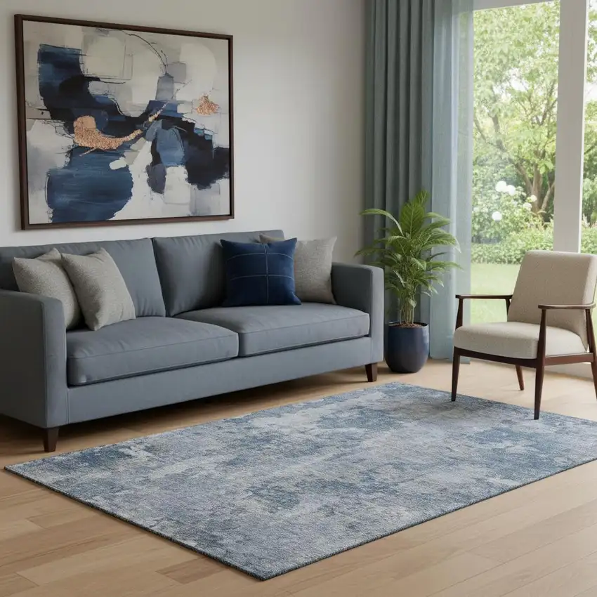 Blue And Ivory Abstract Washable Area Rug With UV Protection Photo 1