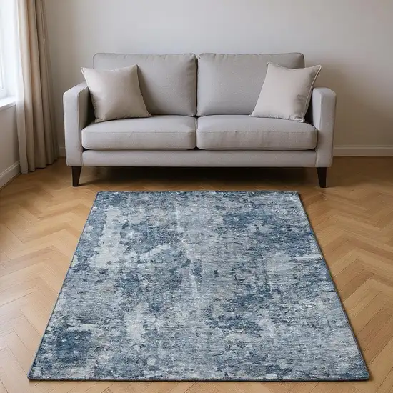 Blue And Ivory Abstract Washable Area Rug With UV Protection Photo 2