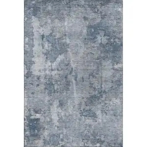Photo of Blue And Ivory Abstract Washable Area Rug With UV Protection