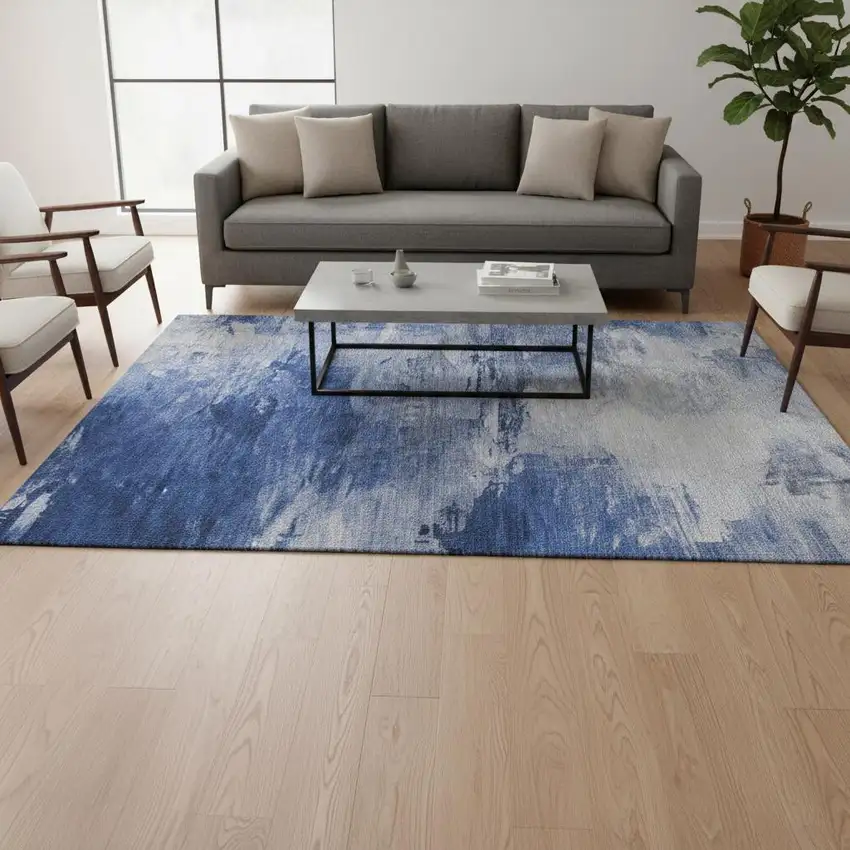 Blue And Ivory Abstract Washable Area Rug With UV Protection Photo 1