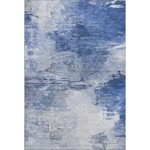 Photo of Blue And Ivory Abstract Washable Area Rug With UV Protection