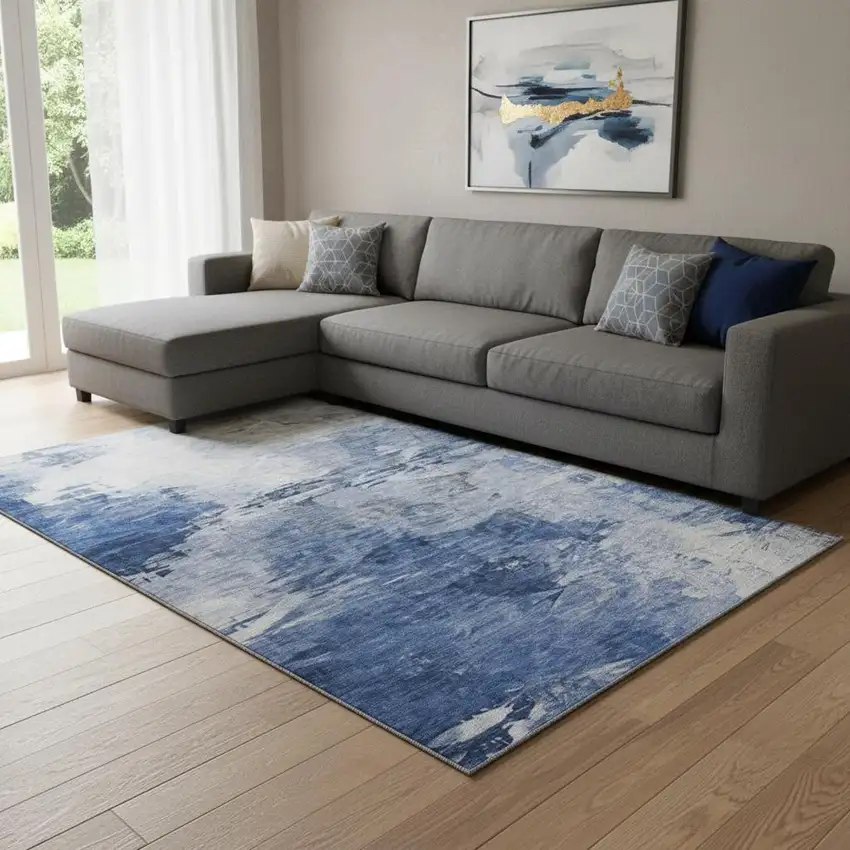 Blue And Ivory Abstract Washable Area Rug With UV Protection Photo 1