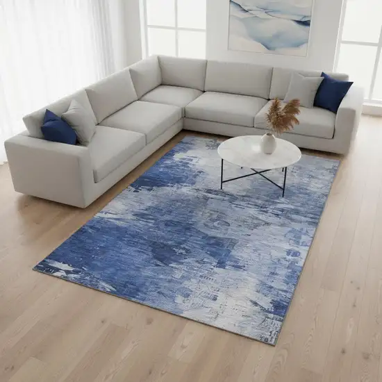 Blue And Ivory Abstract Washable Area Rug With UV Protection Photo 2