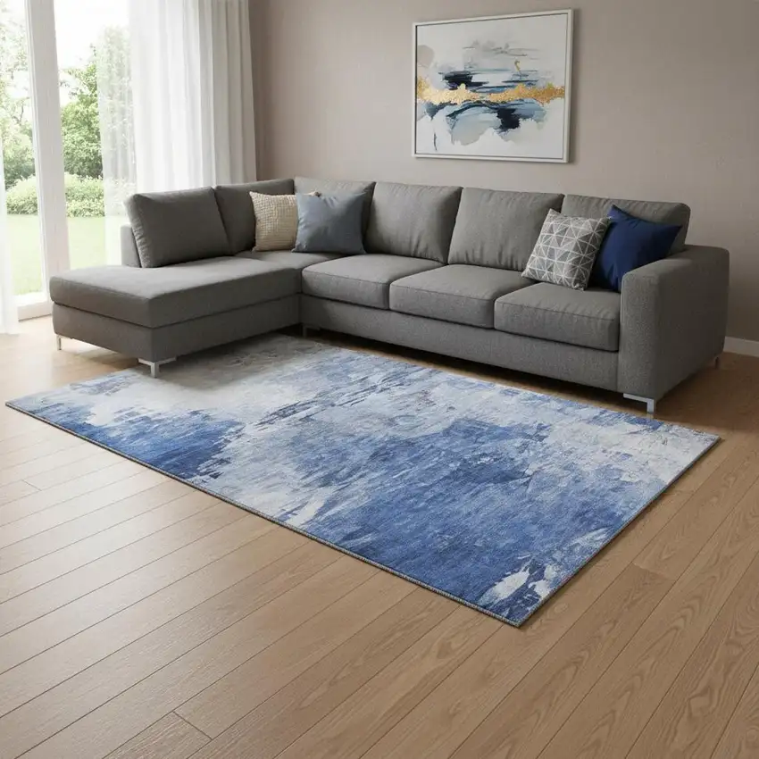 Blue And Ivory Abstract Washable Area Rug With UV Protection Photo 1